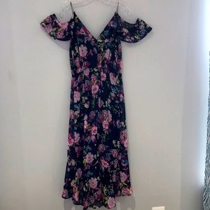 Sundress black, multicolored floral pattern. 100% polyester. Size S